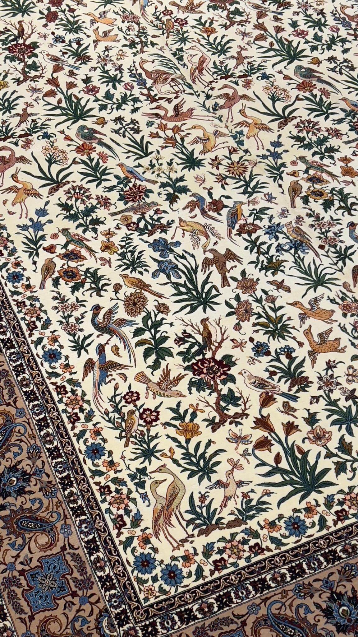 "Seirafian Persian carpet with floral and bird motifs, wool and silk blend"